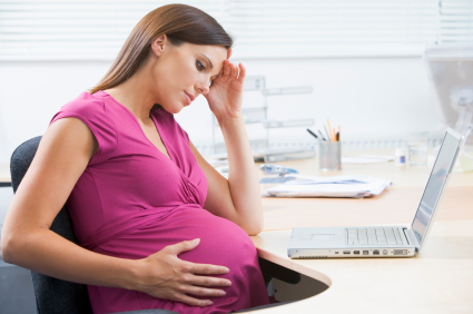 pregnant worker contemplating her leave